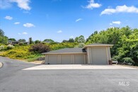 This Riverfront View Home also has an 8 Car Garage Total with a Shop