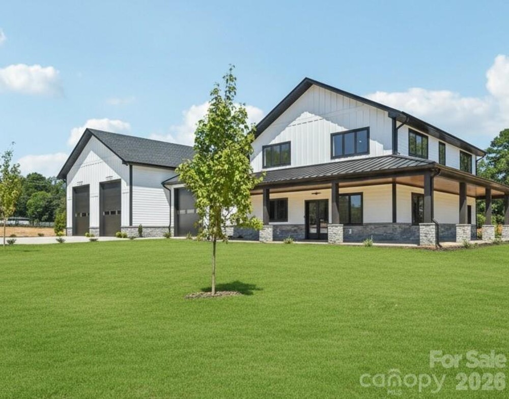 Brand New Barndominium House .. It has a 6 Car Garage with Soaring 16 to 18 Foot Tall Garage Doors and 400-amp Service Panel