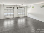 Brand New Barndominium House .. It has a 6 Car Garage with Soaring 16 to 18 Foot Tall Garage Doors and 400-amp Service Panel