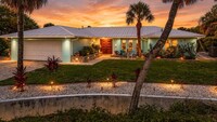 Waterfront Luxury Meets Unmatched Garage Space on the Highly Desirable Manasota Key