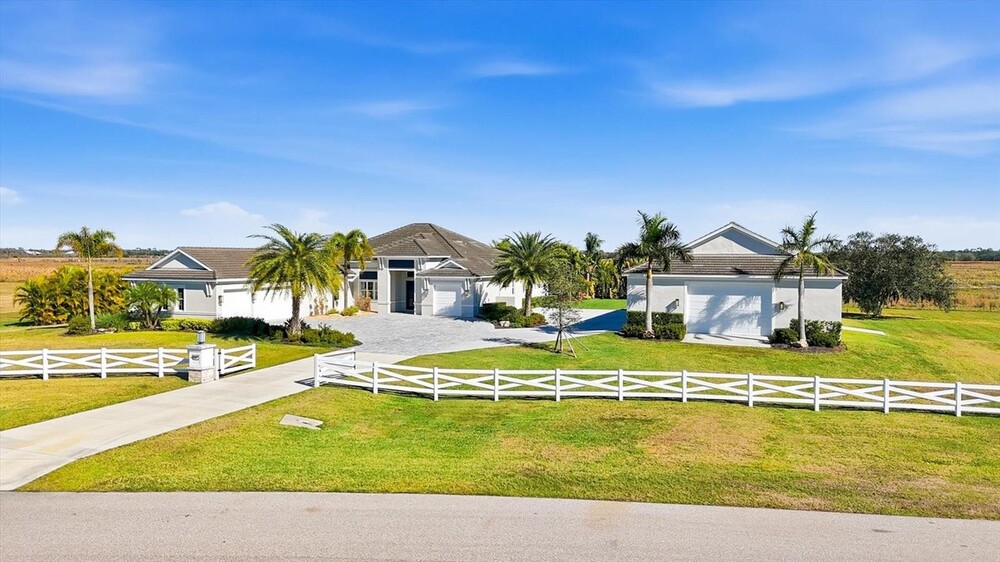 Serious Garage Space Awaits You Here in Modern Home with a Stunning Pool
