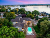 12 Car Garage. One acre. Pool days. Lake days. One spectacular Colorado lifestyle.