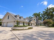 Car Enthusiasts, Collectors, and those needing Additional Storage will appreciate the Impressive Five-Car Garage