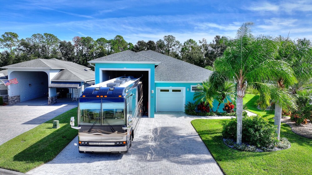 Large lakefront home with 50ft RV garage suitable for car lifts