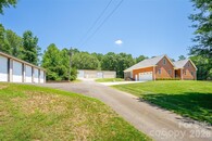 9 Car Garage House on Acreage with a Serious Amount of Garage Space