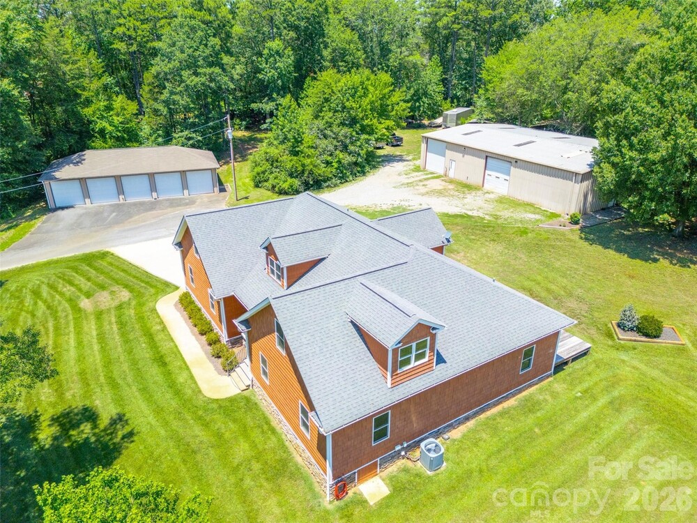 9 Car Garage House on Acreage with a Serious Amount of Garage Space