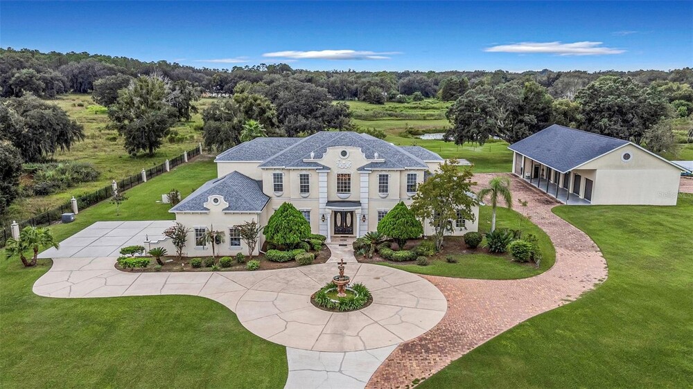 9 Car Garage, No-HOA! Luxury Estate on 10 Acres in Wesley Chapel