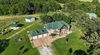 Spectacular 310-acre estate 8 minutes north of Branson West with a 6 Car Garage
