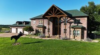 Spectacular 310-acre estate 8 minutes north of Branson West with a 6 Car Garage