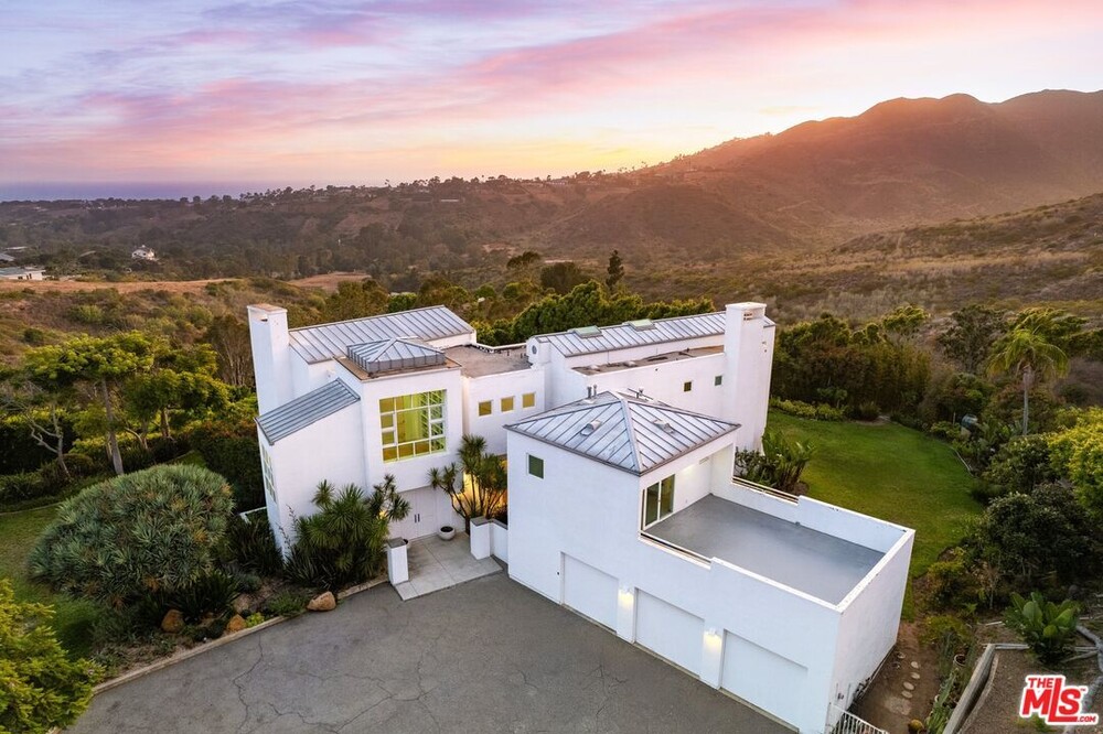 Live in Malibu with a 6 Car Garage, Views, Privacy and Acreage!