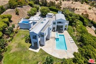 Live in Malibu with a 6 Car Garage, Views, Privacy and Acreage!