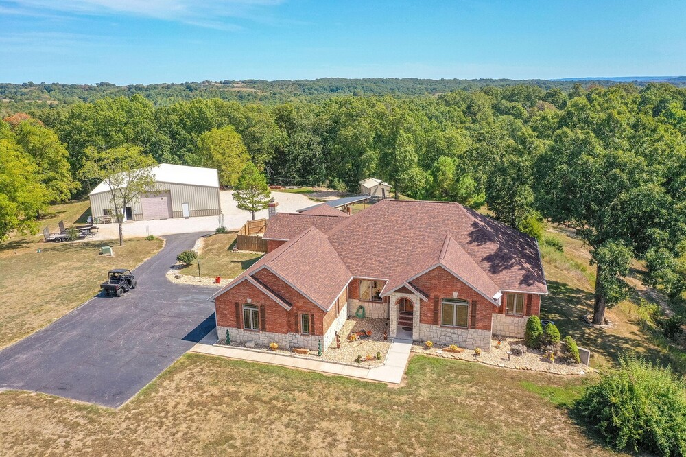 Private 9.41-Acre Estate with Resort-Style Pool, 60x60 Shop & Guest Apartment!