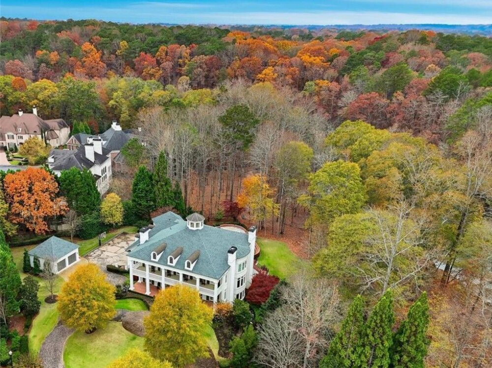6 Car Garage, Waterfront House with Classic Southern Elegance